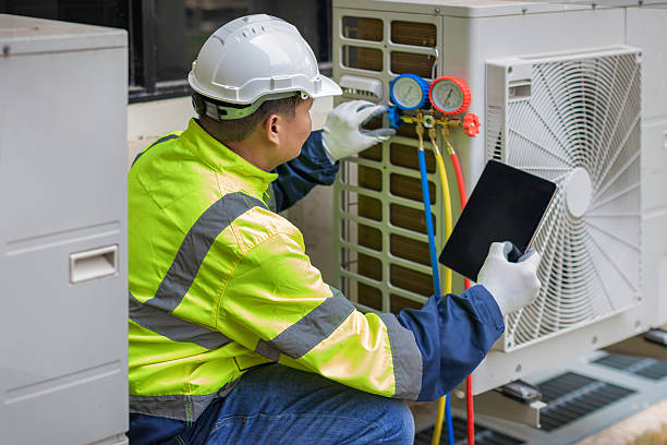 Professional Air Conditioning Repair technician working in Plainfield, IN